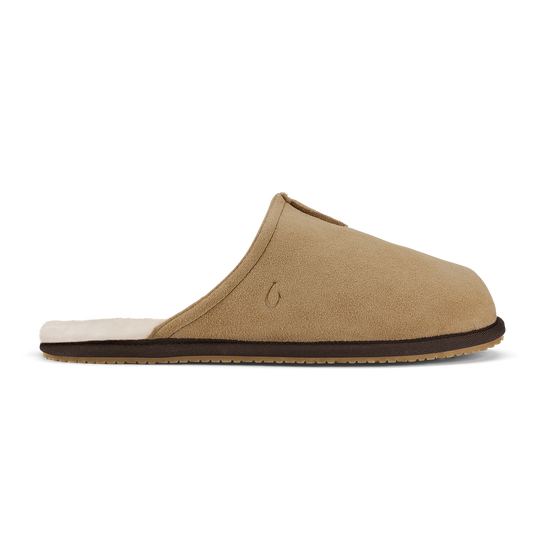 Tan suede slipper with dark java trim, cream fleece lining, and textured sole.